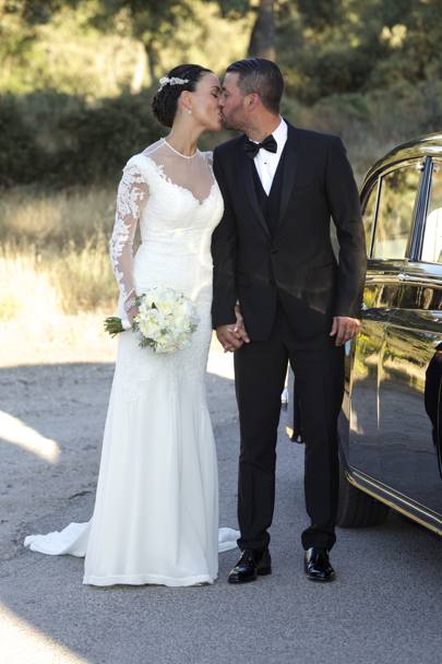 Rene Ramos con la sposa Vania (Action Images)